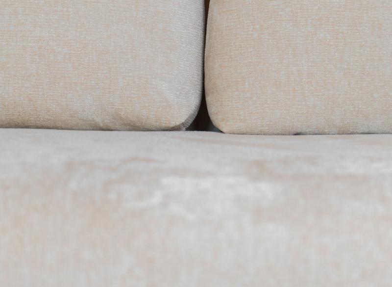 Struktura nowoczesnej beżowej tkaniny meblowej.