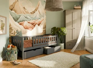 Nowoczesny pokój dziecięcy z grafitowym łóżkiem parterowym i szafą.